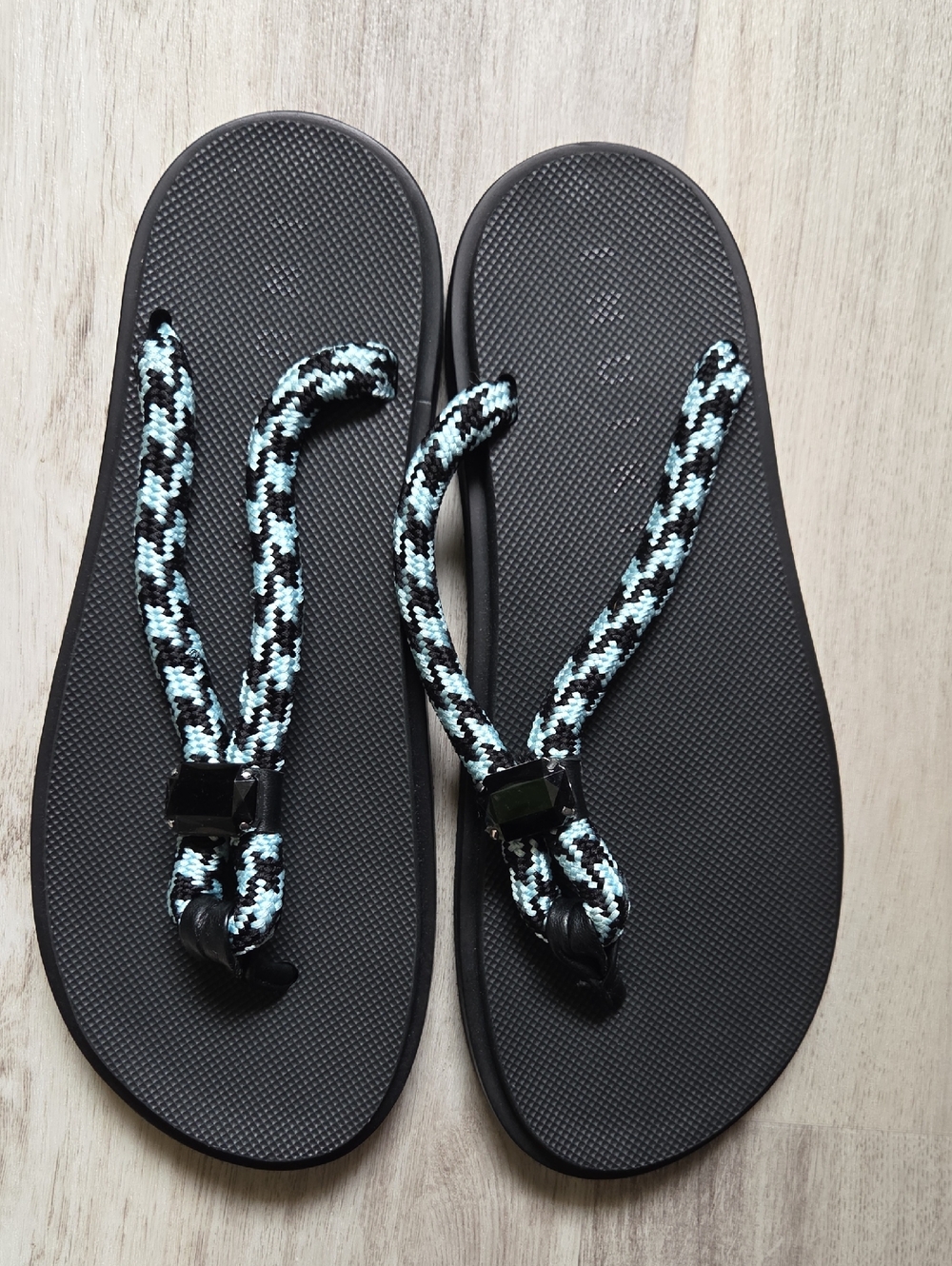 Inuikii Black Sandal with Black and Light Blue Braided Straps